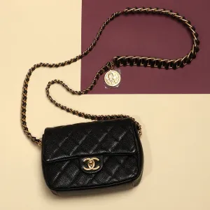 Chanel Mini Black Quilted Caviar Mdallion Flap