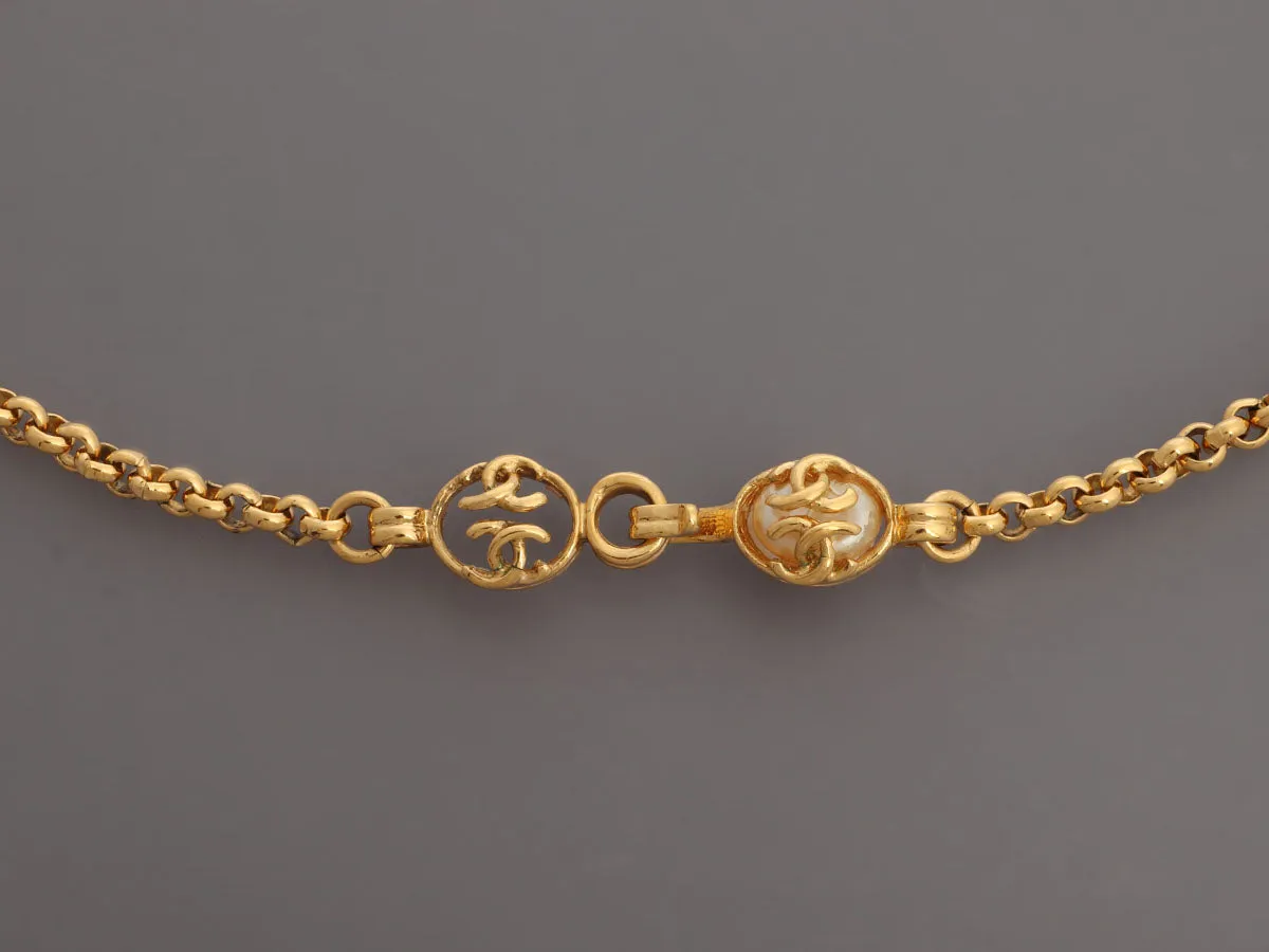 Chanel Vintage Long Pearl Logo Medallion Pendant Necklace